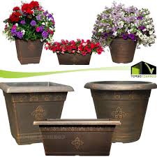 Use these lovely planters to give all your flowers and plants a home outside. Large Copper Plastic Planters Outdoor Garden Flower Pots