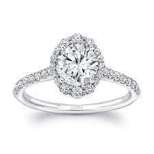 Halo rings are likely to drop out of favor, sooner or later. Uneek Round Diamond Engagement Ring With Oval Illu