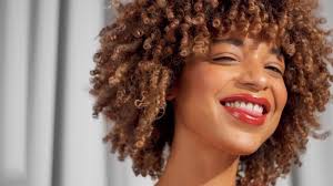 mixed race black woman with curly hair