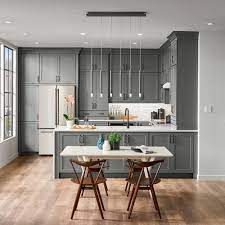 Bare brick walls is another very popular feature of industrial style. American Woodmark Custom Kitchen Cabinets Shown In Industrial Style Hdinstbl The Home Depot
