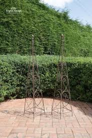rust coloured metal garden obelisk