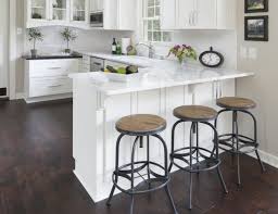 A furniture style kitchen island provides a relaxed yet chic look to your kitchen. No Room For A Kitchen Island Add A Peninsula To Your Kitchen Dura Supreme Cabinetry