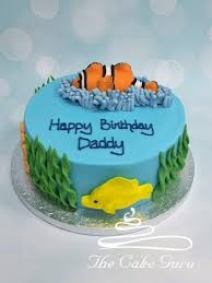Spread pudding on bottom layers and replace tops. Tropical Fish Birthday Cake The Cake Guru