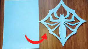 how to cut paper spider web