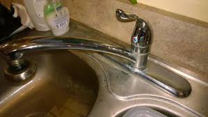 remove kitchen faucet with u bracket