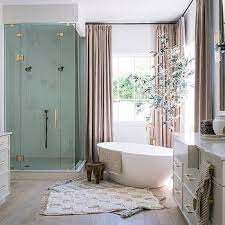 tub with 2 shower curtains design ideas