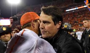 Image result for will muschamp shaking dabo's hand