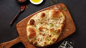 warm naan topped with olive oil and