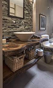 Love the idea or repurposing an antique dresser as a vanity! Rustic Bathroom With A Live Edge Wood Countertop Bathroom Vanity Remodel Rustic Bathrooms Rustic Bathroom Vanities