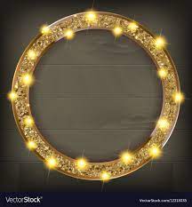 round gold frame on a wooden background