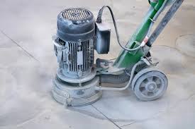 concrete with a grinding machine repair