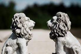 Pair Of Lions Garden Ornaments With