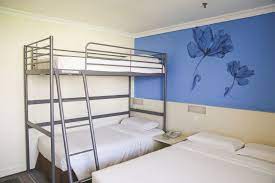 single bed in 4 bed dormitory room