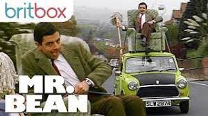 mr bean driving on the roof of his car
