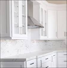 White shaker kitchen collection with onyx accent collection for the island. Kitchen Cabinets Toronto Granite Quartz Countertops I Rockwood Kitchens