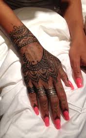 Rihanna right hand tribal tattoo. Pin On Rih Rih Bad Ass