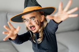 wearing witch hat costume