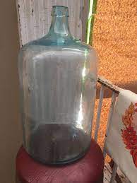 blue gl water jug antique