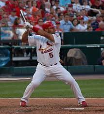 Those stats which pujols led in 2009 should be listed in the 2009 section (which really needs some actual prose expansion and formatting help), and the pronunciation given for albert pujols' name is incorrect. Albert Pujols Wikipedia