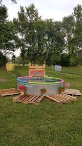 In this picture beautiful recycled pallet floating deck idea is shown which is for your outdoor sitting and it is also placed outdoor that you can watch it clearly in the picture. Galvanized Stock Tank Turned Into Backyard Private Pool Proud Home Decor