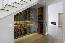 Check spelling or type a new query. Wait Until You See Scott Disick S Swanky New Bachelor Pad Photos Scott Disick House Under Stairs Wine Cellar Home Wine Cellars