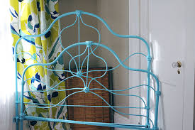 painting a vintage iron bed blue a