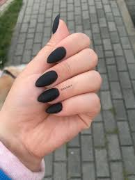 matte black almond nails image