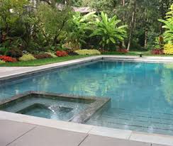 Swimming pool in backyard with fountain. Swim In Our Swimming Pools In Portland Or