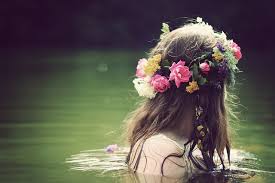Image result for flowers in the hair