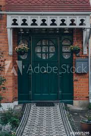 stained glass black front door of a