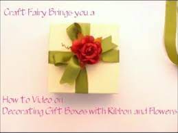 ribbon and flower decorated gift box