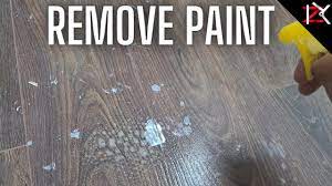 remove dry paint off laminate flooring