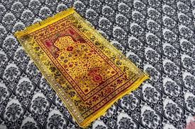 masjid yellow prayer rug