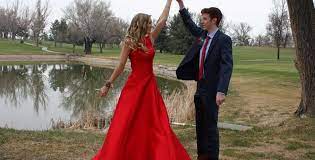 prom red dress with blonde hair