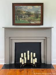 grey fireplace mantel and surround in