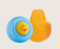 smiley face treat dispensing dog toy