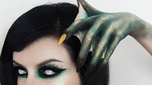 webbed hand mermaid makeup you