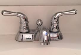 remove a two handle bathroom faucet