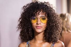Long naturally curly hairstyles with bangs. 21 Best Curly Hair Products Of 2019 Shampoo Curl Cream And More Allure