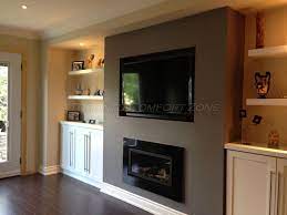 A Linear Gas Fireplace With Cabinets