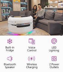 This table is best for smaller living rooms because of its round shape. Coosno The Smart Coffee Table Redefined Indiegogo