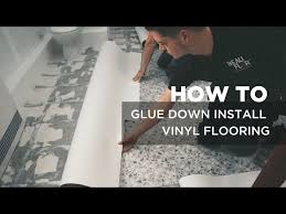 glue and install vinyl sheet flooring