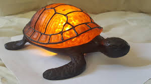 pair sea turtle lamps 1 amber w bronze