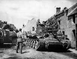 The express cartoonist giles sketches as cromwell tank crewmen work on their vehicles, 1 may 1945. A 1st Polish Armored Division Cromwell Tank Rolls Through A French Village On The Way To