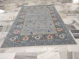 hand knotted oushak rug furniture