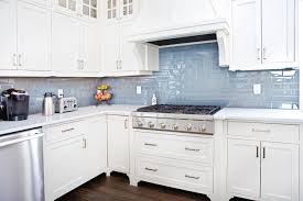 white shaker kitchen cabinets stone