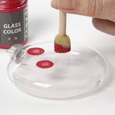 A Clear Flat Glass Bauble With Glass Paint
