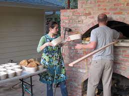 bake bread in a wood fired oven