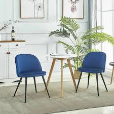 Modern dining chairs can be made of wood, metal, plastic, or upholstery and come in a large variety of colors ranging from neutral palettes to more bold colors to add an accent to the dining room. Dining Chair With Armrests Dark Blue Velvet For Sale Online Ebay