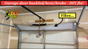 garage door buckled bent broke diy